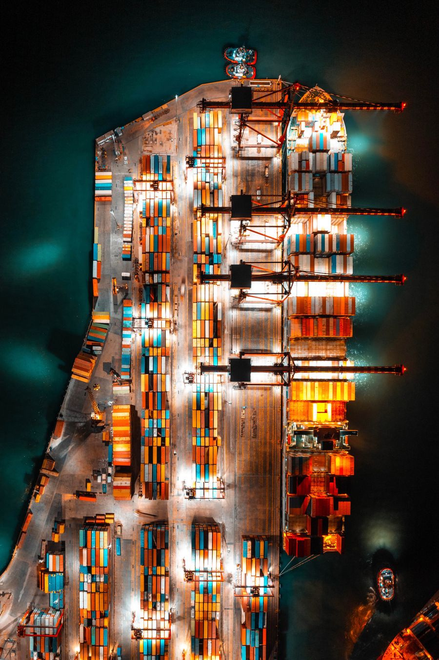 Aerial view of a container ship at a busy port